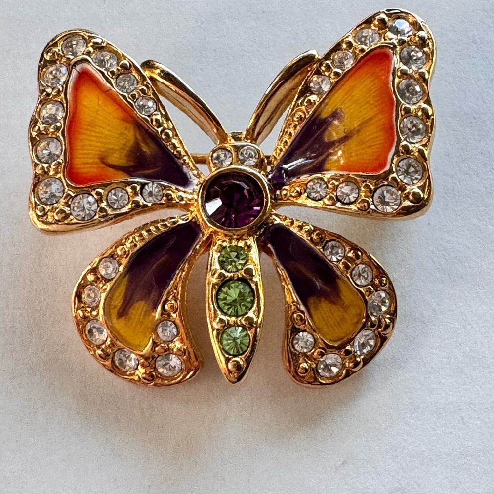 Joan Rivers butterfly pin